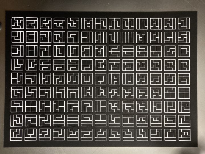 Four districts in a four by four city, white on black